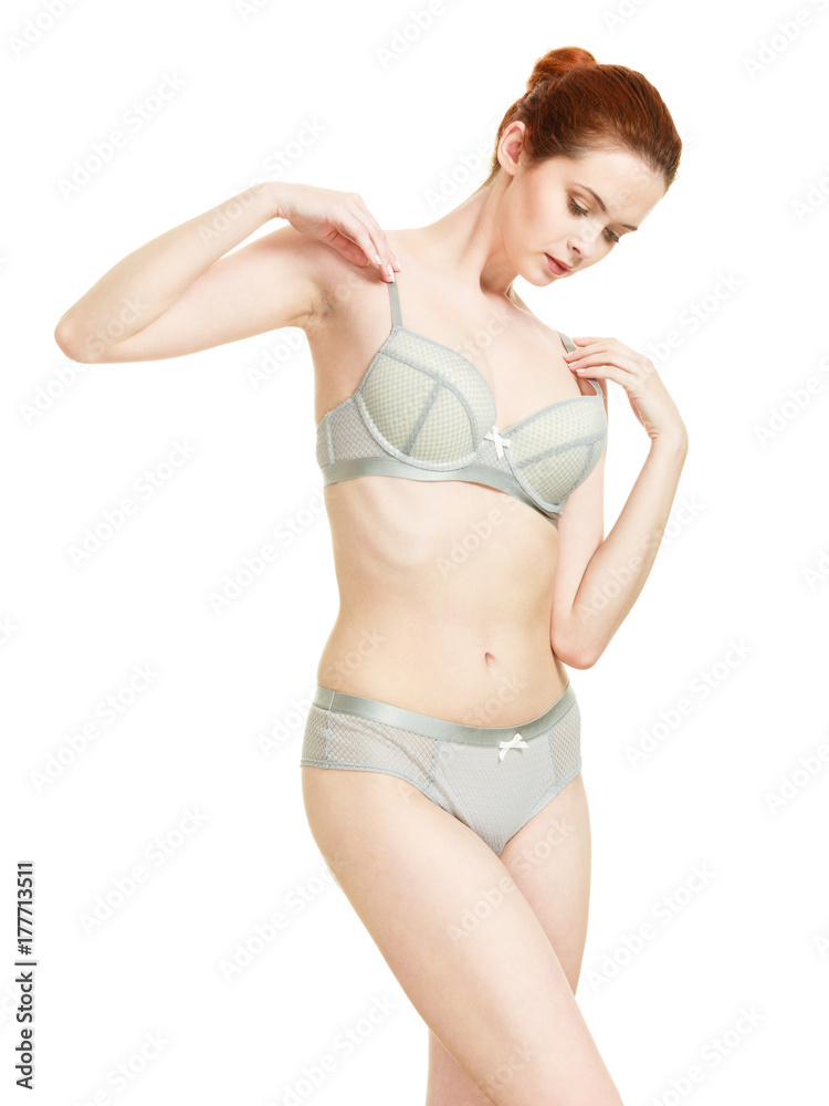 Attractive slim woman in grey matching underwear Attractive slim woman in grey matching underwear