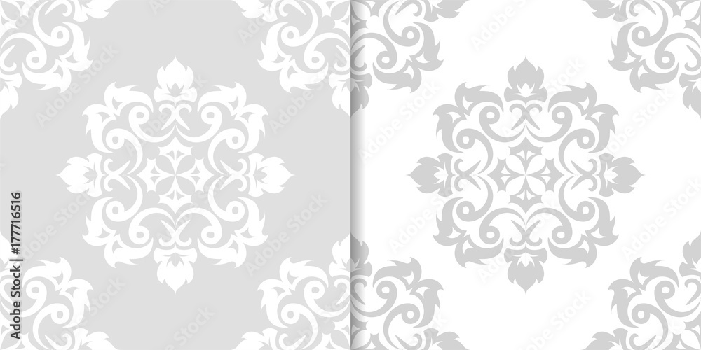 Light gray floral backgrounds. Set of seamless patterns Light gray floral backgrounds. Set of seamless patterns