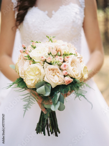 wedding bouquet in bride's hands