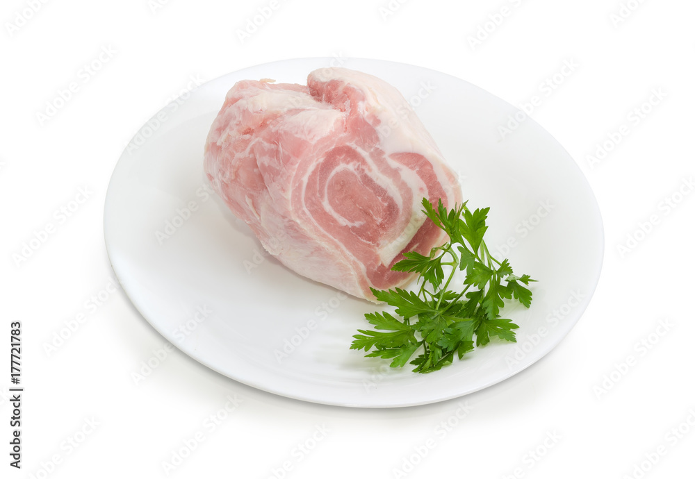 Uncooked streaky pork belly with parsley twigs Uncooked streaky pork belly with parsley twigs
