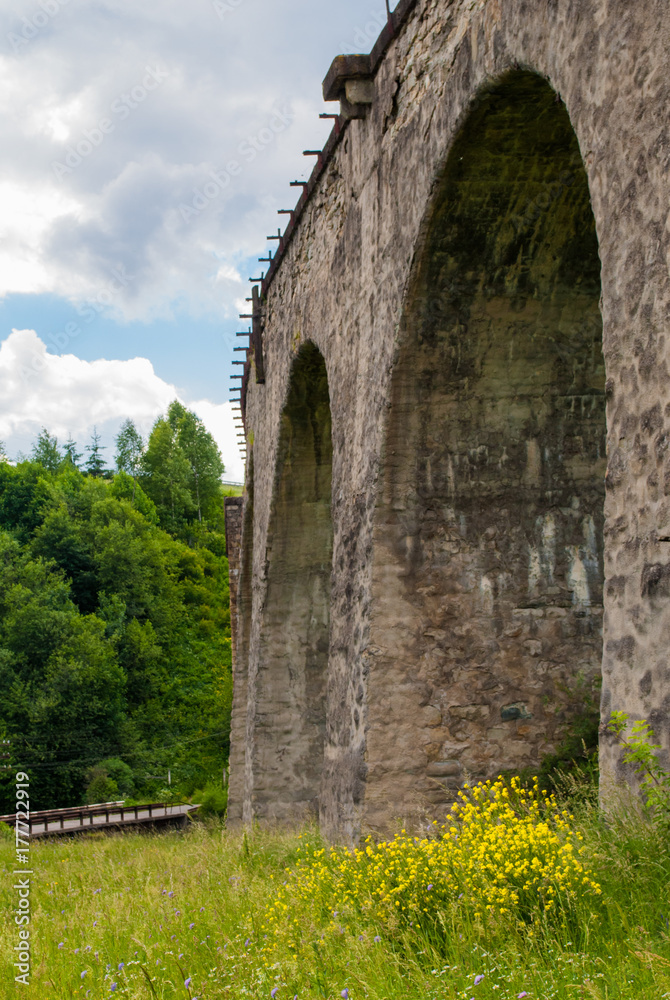 The old Austrian stone railway bridge viaduct in Ukraine