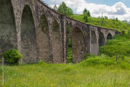 The old Austrian stone railway bridge viaduct in Ukraine © Ann