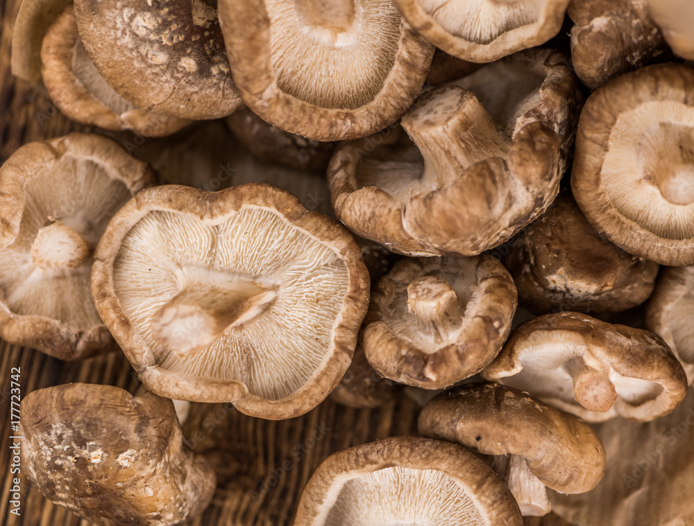 Portion of Raw Shiitake mushrooms, selective focus Portion of Raw Shiitake mushrooms, selective focus