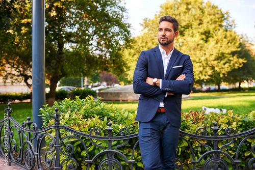 Slika na platnu Young businessman at a park