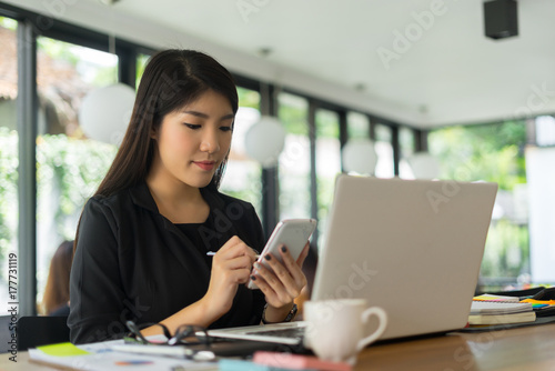 modern business woman working with smartphone in office