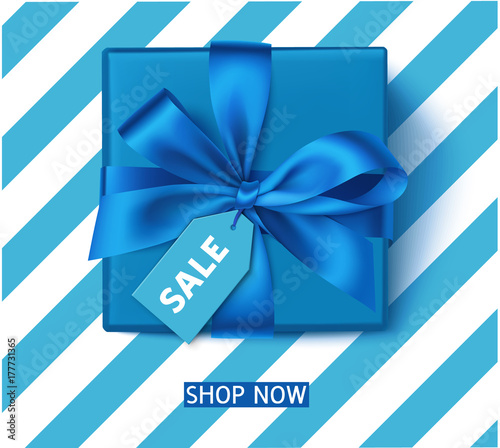 Decorative blue gift box with blue bow and sale tag. Winter holiday or Father's Day decoration. Vector illustration
