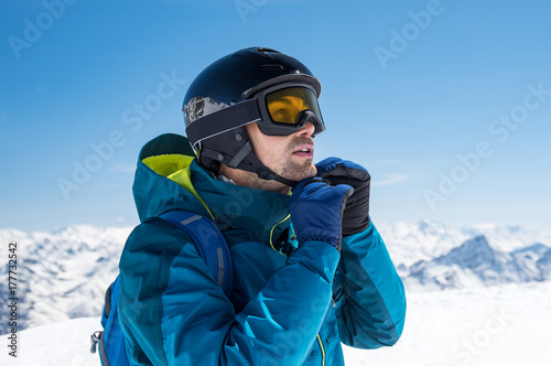 Man wearing ski helmet