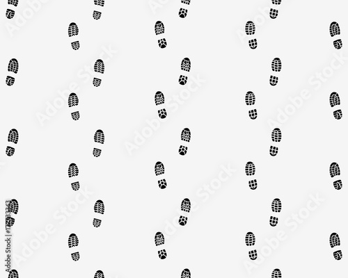 Black prints of shoes on a white background, seamless