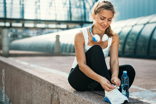 Picture of young attractive happy fitness woman