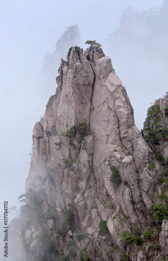Lone rock over mist in Huangshan Mountain (Yellow Mountain) in Anhui Province, China