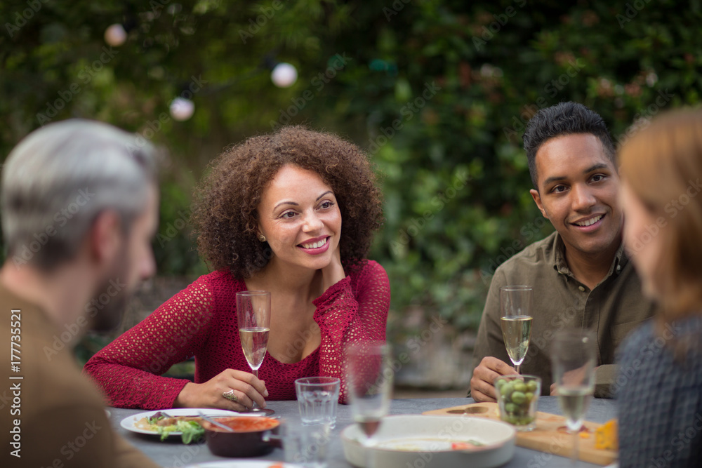 Friends enjoying meal together Friends enjoying meal together