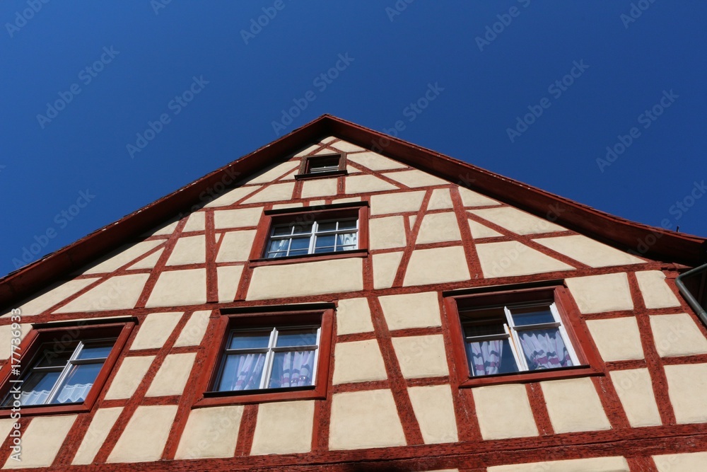 Top of a half-timbered house against blue sky (Meersburg, Lake Constance, Germany)