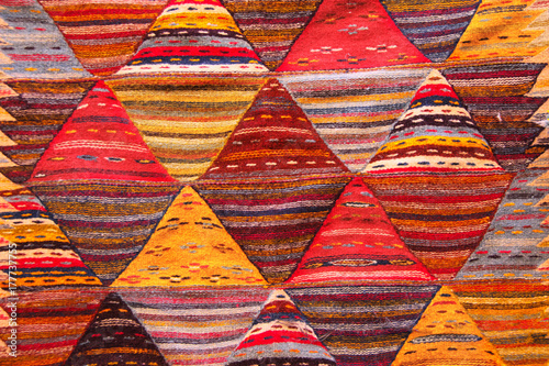 Texture of berber traditional wool carpet, Morocco, Africa photo