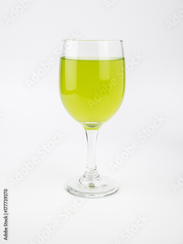 Pandan and pandan juice is made from the crushed or boiled. It health drink in clear glass.isolate on white background