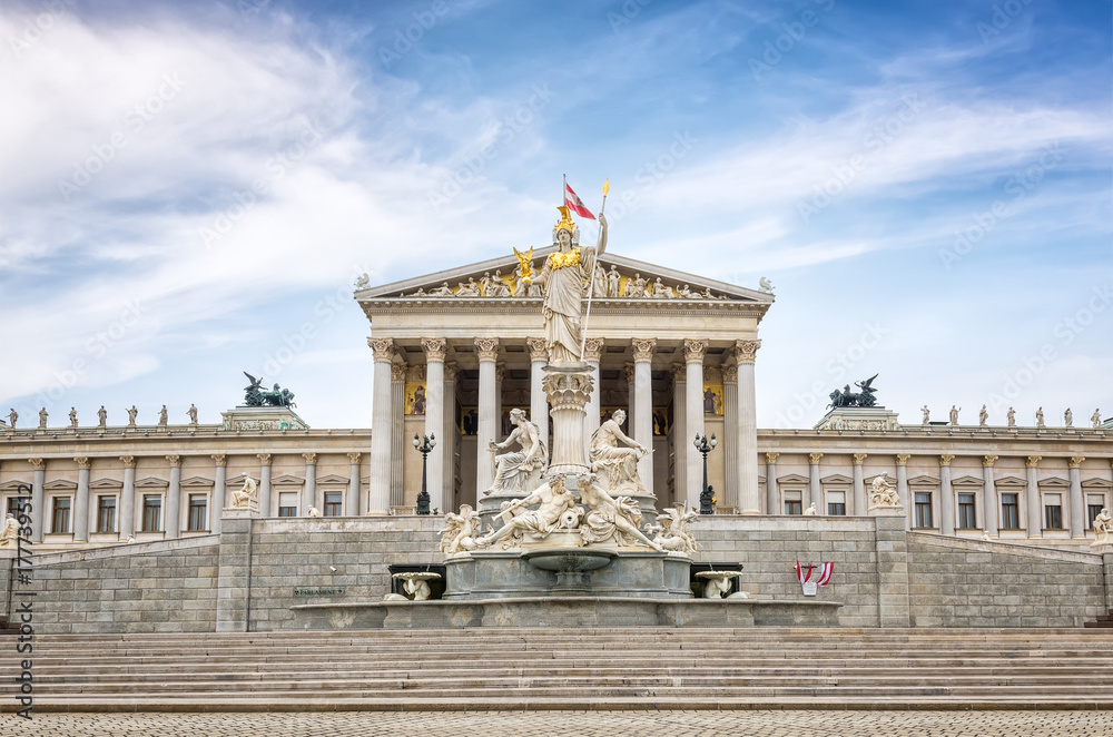 Naklejka premium Austrian Parliament Building / The Pallas-Athene Fountain in front of the Neoclassical temple of parliament government in Vienna, Austria