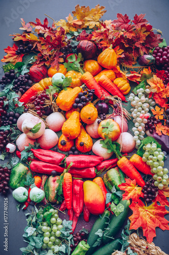 Autumn nature concept. Fall fruit and vegetables on wood. Thanksgiving dinner