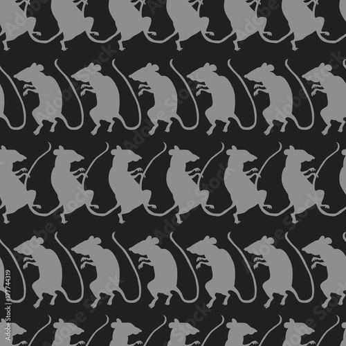 Rat silhouettes on black background. Seamless pattern.