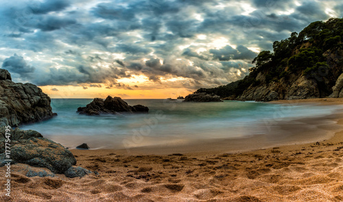 Sunset on a beach of LLorert de Mar on the Costa Brava