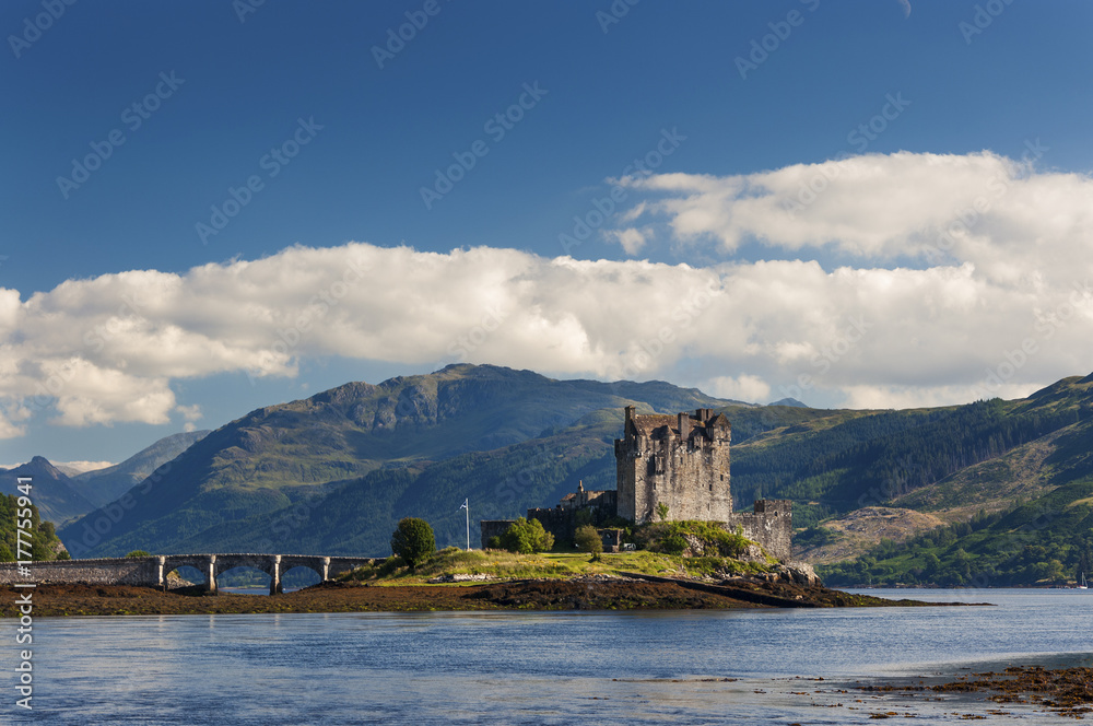View of the Eilean Donan Castle in the Highlands of Scotland, United Kingdom; Concept for travel in Scotland