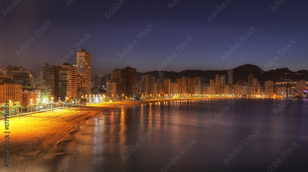 Editorial Benidorm, Spain - October 9, 2017: Peaceful and tranquil morning on Levante Beach until the masses of tourists fill the pristine sandy bay at the popular Spanish holiday resort of Benidorm