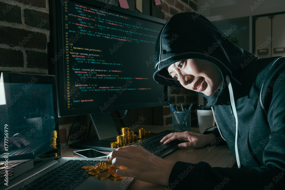 happy young woman hacking global business computer