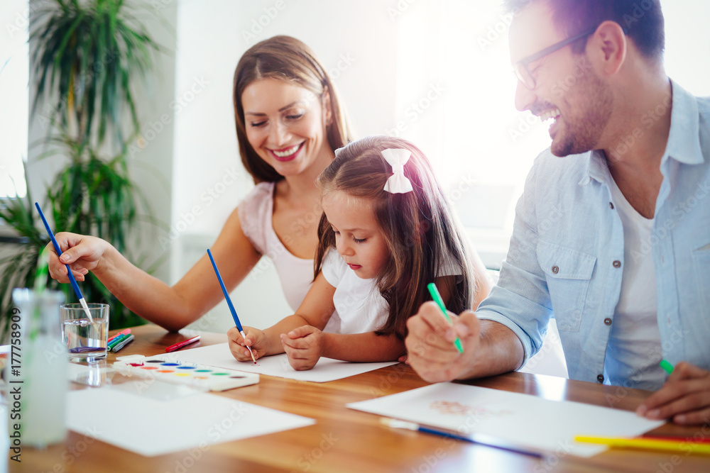 Fototapeta premium Happy familiy spending fun time at home