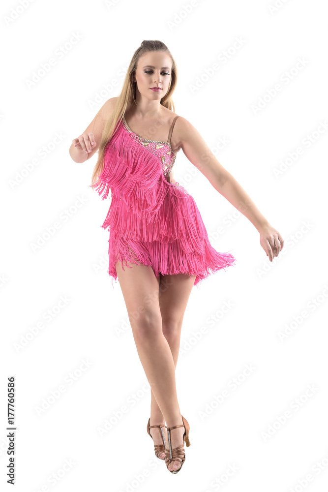 Professional woman dancing latino dances looking down. Front view. Full body length portrait isolated on white studio background. 