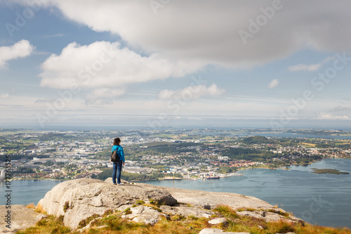 Woman on a peak of mountain