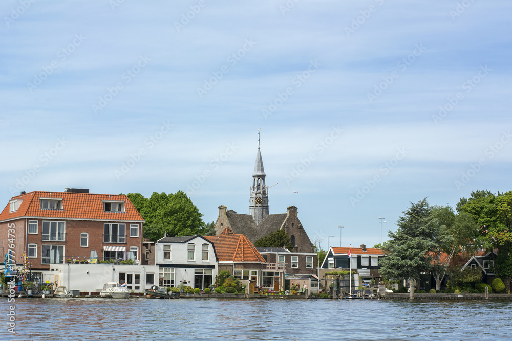 Many dutch houses along the river in Zaanse Schans (Netherlands)
