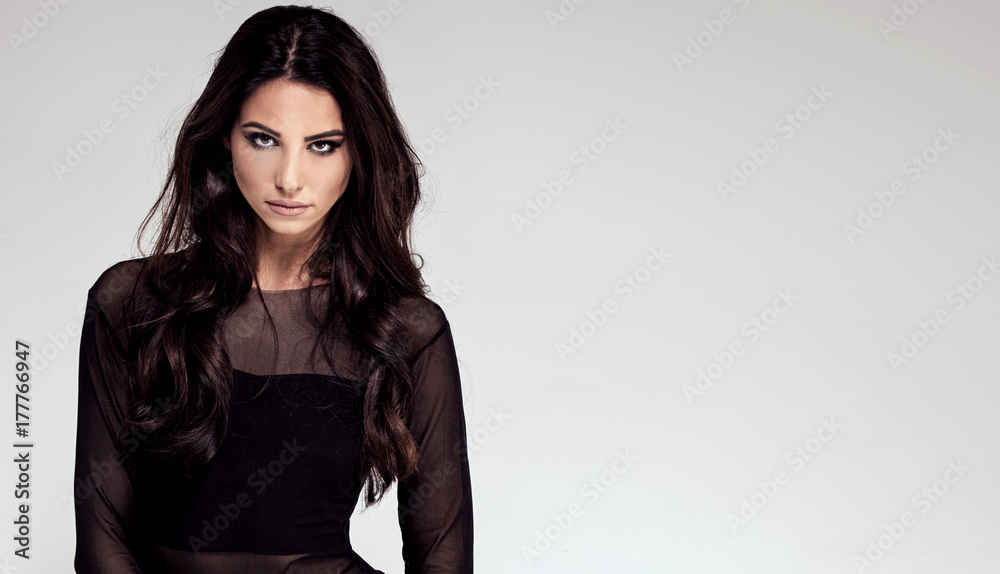 Sensual attractive lady posing in studio. Sensual attractive lady posing in studio.
