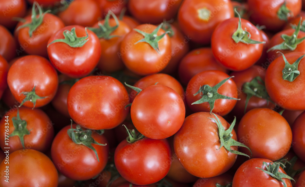 Qualitative background from tomatoes. Fresh tomatoes. Red tomatoes. Village market organic tomatoes. Qualitative background from tomatoes. Fresh tomatoes. Red tomatoes. Village market organic tomatoes.