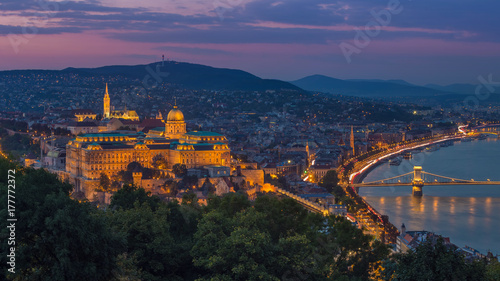 Budapest, Hungary - Colorful sunset at magic hour over Budapest with Buda Castle Royal Palace and famous Szechenyi Chain Bridge