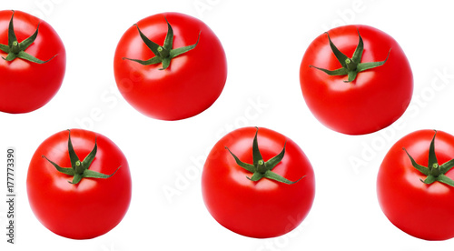 A few tomatoes on the white isolated background, closeup