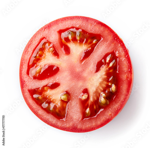 Tomato slice isolated on white background, top view