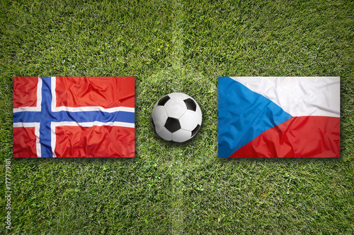 Norway vs. Czech Republic flags on soccer field