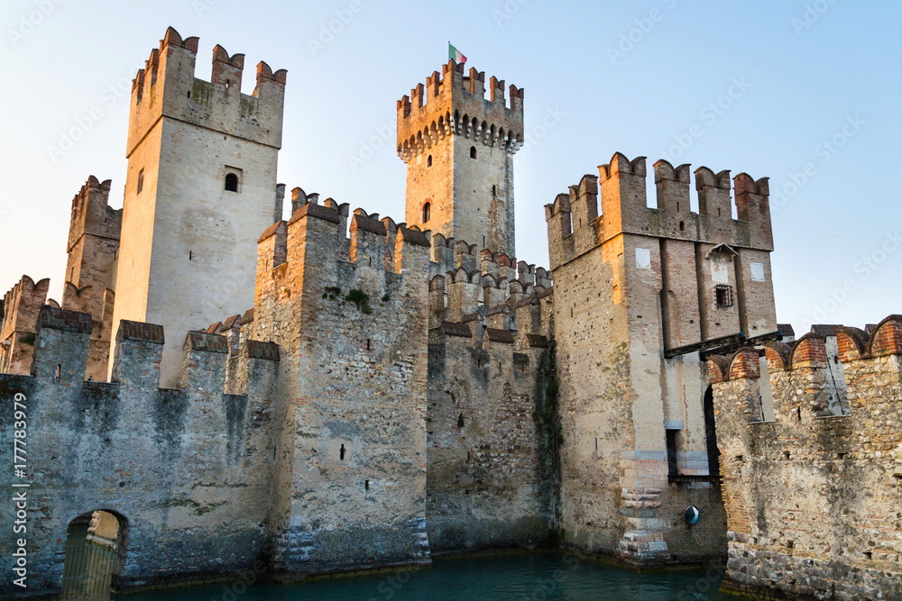 The Scaliger Castle in Sirmione, Italy during sunset