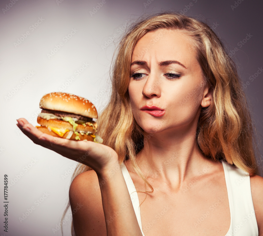 Female with hamburger