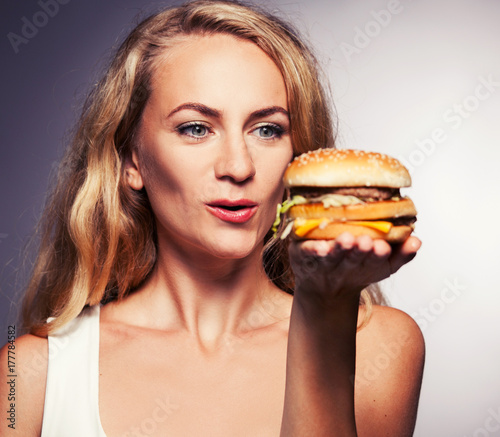 Female with hamburger
