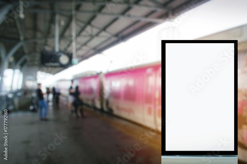 mock up of blank advertising light box or showcase billboard for your text message or media and content with people waiting sky train at train station, commercial, marketing and advertising concept