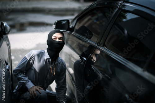 Fotografie, Obraz robber in black mask. robbery and crime concept.