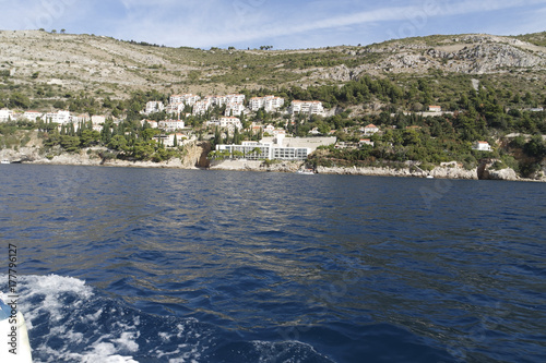 wild coast of croatian town dubrovnik from a boat