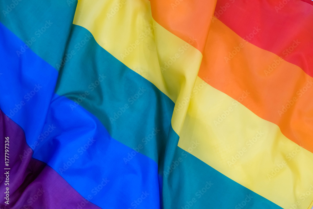 Fototapeta Tkaniny tekstura homoseksualny chorągwiany tło. LGBT macha flagą
