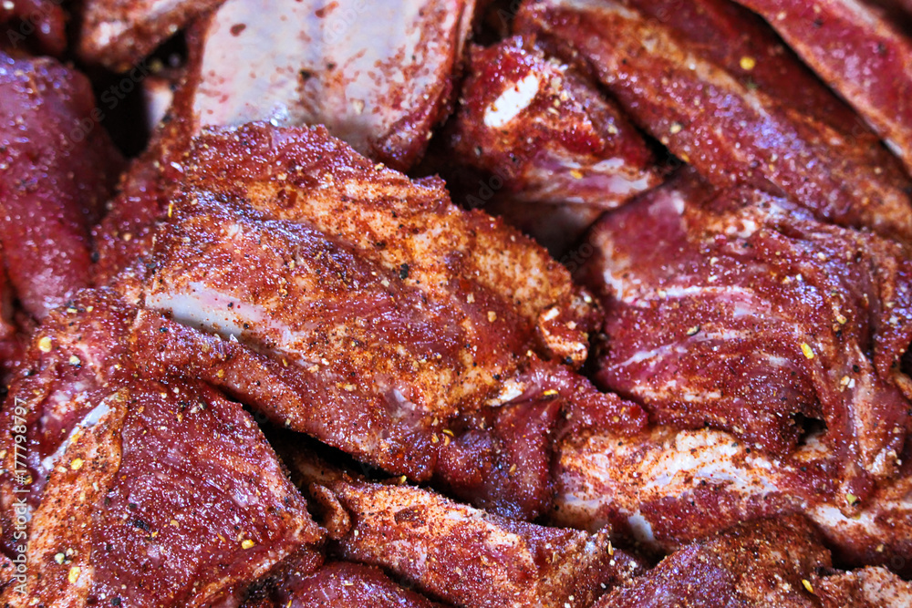 Closeup of pork ribs with a dry rub
