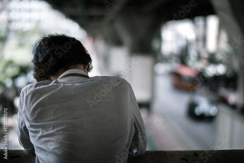 business man is stressed from his work. depression and anxiety concept.