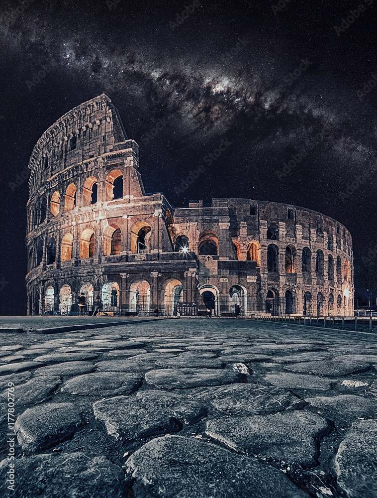 The Colosseum under the milky way in Rome