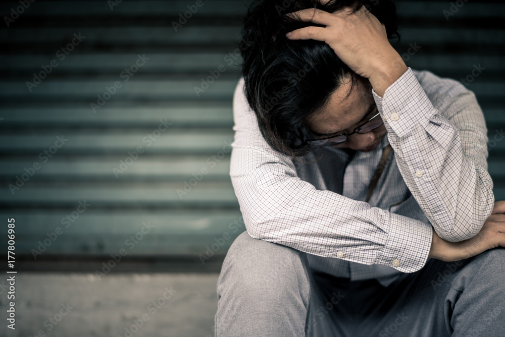 business man is stressed from his work. depression and anxiety concept. business man is stressed from his work. depression and anxiety concept.