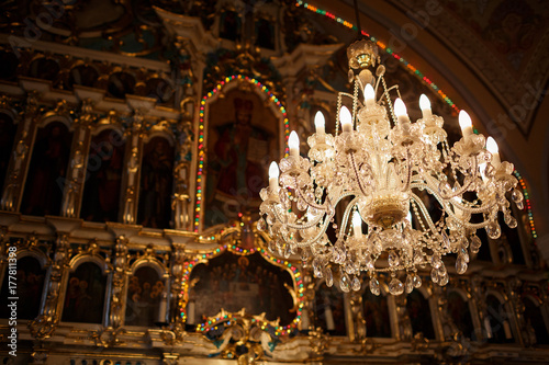 luxurious chandelier decorates the interior of the big temple