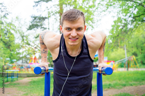 Guy working out outside