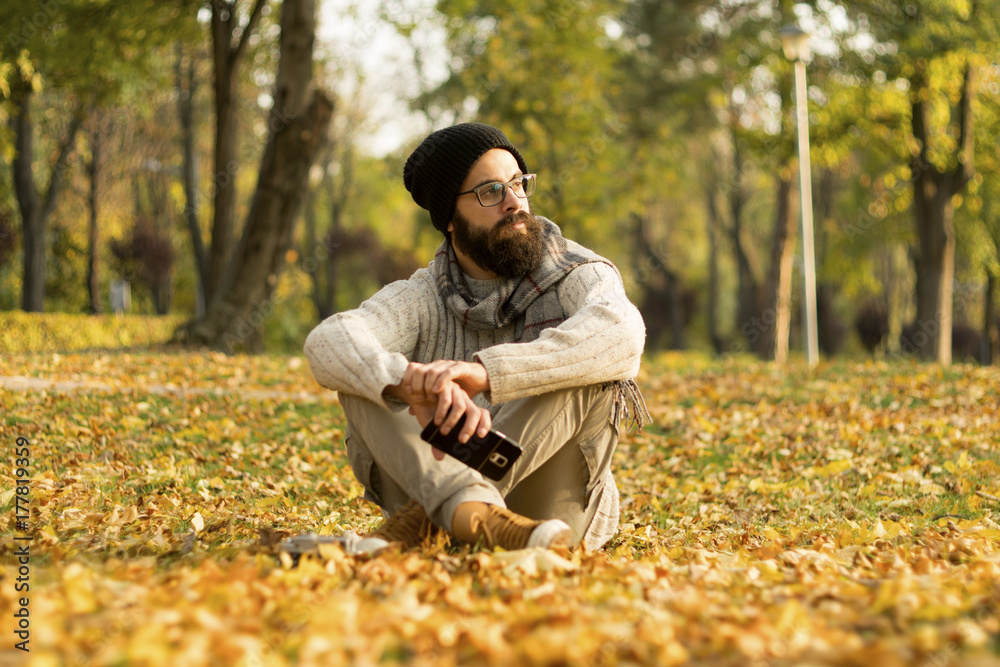 Handsome Man Using Mobile Smart Phone Outdoors Handsome Man Using Mobile Smart Phone Outdoors