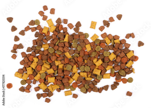 Dry cat food isolated on white background, top view